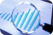 Bar chart showing data trends with vertical blue and teal bars representing different categories or time periods rounded corners