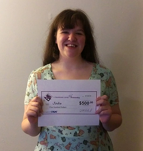 NEDP Changing Lives Scholarship Recipient Jodie Jodie-Amato-with-check-web